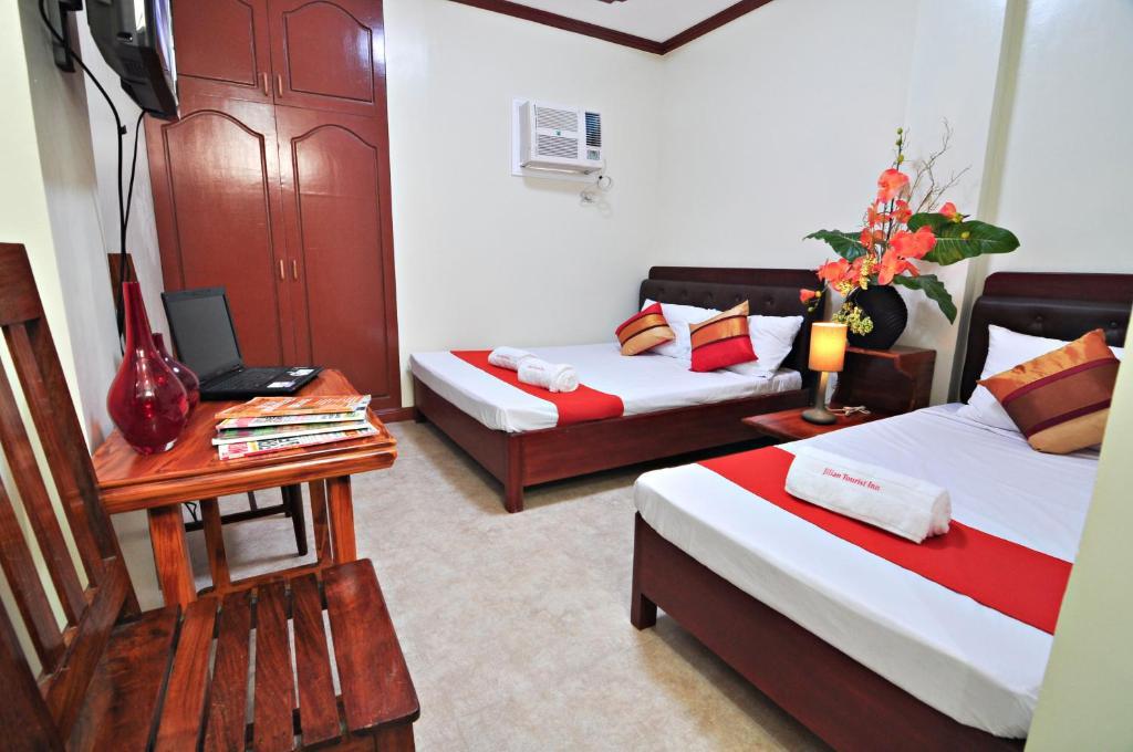 Jilian Tourist Inn Puerto Princesa Cameră foto